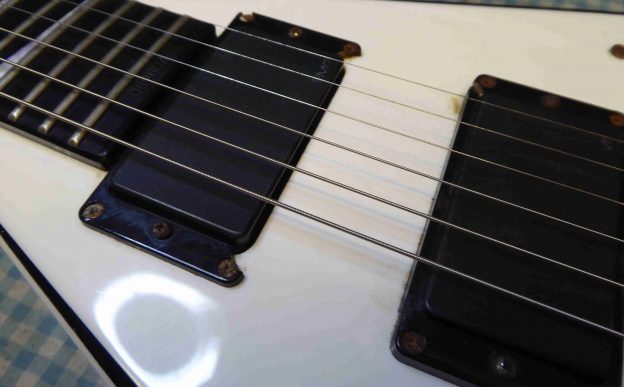 Close up of the Jackson with it's broken pickup rings.