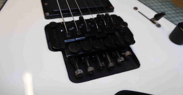Closeup view of a Floyd Rose Tremolo fitted to a Jackson guitar