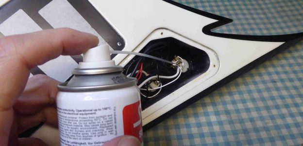 Cleaning a set of Jackson Guitar volume and tone controls with switch cleaner