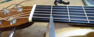 Measuring the action height at the first fret on a Martin acoustic guitar