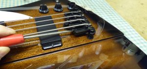Adjusting the intonation of a Gibson Firebird Bass