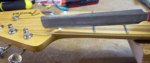 Cutting the nut slots a little deeper on a fender stratocaster