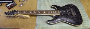 Schecter 7 string guitar before repair by Guitar-George