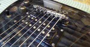 Schecter 7 string with new bridge fitted by Guitar-George