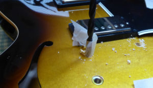 Drilling the holes into the top of the Gibson ES335 for the new bridge posts
